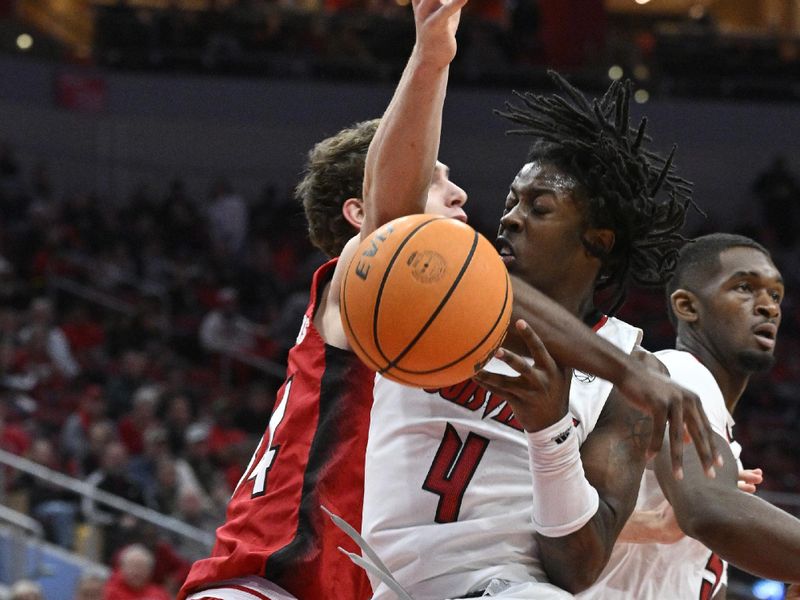 Jan 13, 2024; Louisville, Kentucky, USA;  Louisville Cardinals guard Ty-Laur Johnson (4) draws a foul from North Carolina State Wolfpack forward Ben Middlebrooks (34) during the first half at KFC Yum! Center. Mandatory Credit: Jamie Rhodes-USA TODAY Sports