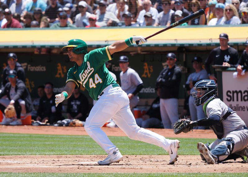 Jun 29, 2023; Oakland, California, USA; Oakland Athletics catcher Carlos Perez (44) hits a single against the New York Yankees during the first inning at Oakland-Alameda County Coliseum. Mandatory Credit: Kelley L Cox-USA TODAY Sports