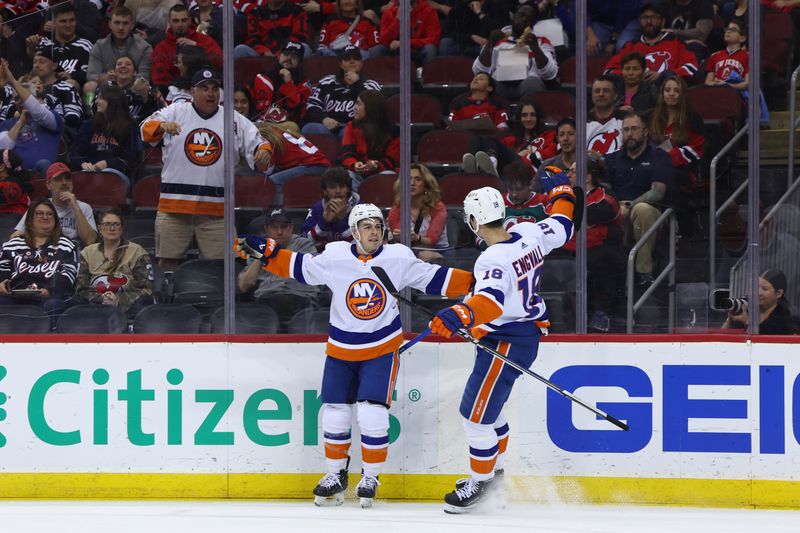 Apr 15, 2024; Newark, New Jersey, USA; New York Islanders center Jean-Gabriel Pageau (44) celebrates his goal against the New Jersey Devils during the first period at Prudential Center. Mandatory Credit: Ed Mulholland-USA TODAY Sports