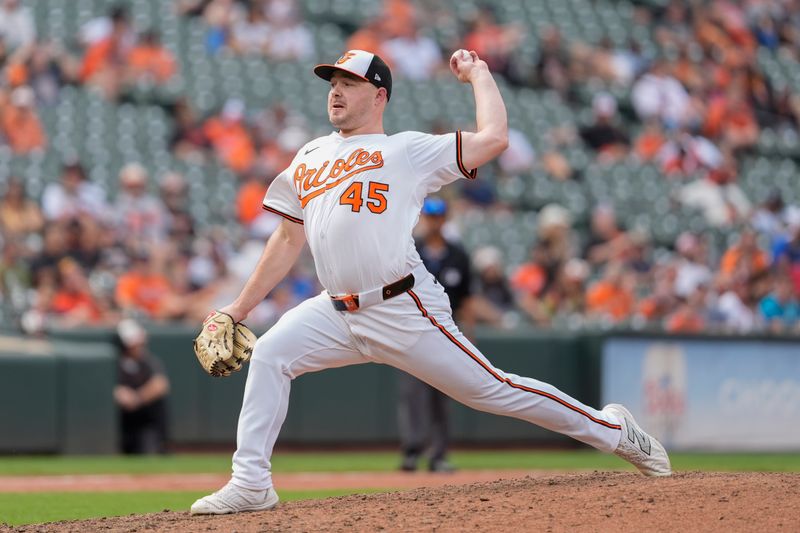 Aug 24, 2025; Baltimore, Maryland, USA; Baltimore Orioles pitcher Keegan Akin (45) delivers a pitch against the Houston Astros during the eighth inning at Oriole Park at Camden Yards. Mandatory Credit: Gregory Fisher-Imagn Images