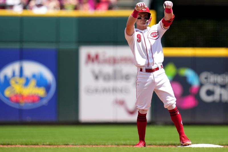 Jun 25, 2023; Cincinnati, Ohio, USA; Cincinnati Reds second baseman Matt McLain (9) gestures toward the dugout after hitting a double in the third inning against the Atlanta Braves at Great American Ball Park. The Atlanta Braves won, 7-6. Mandatory Credit: Kareem Elgazzar-USA TODAY Sports