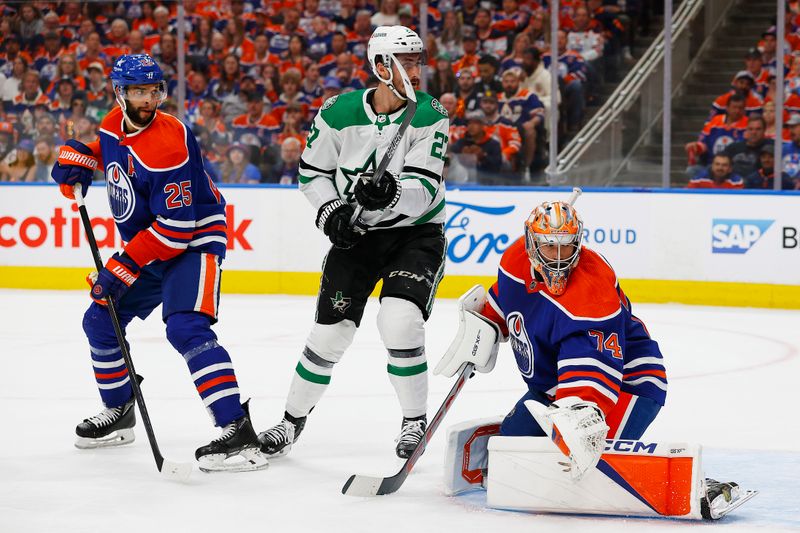 Jun 2, 2024; Edmonton, Alberta, CAN; Dallas Stars forward Mason Marchment (27) looks for a loose puck in front of Edmonton Oilers goaltender Stuart Skinner (74) during the second period in game six of the Western Conference Final of the 2024 Stanley Cup Playoffs at Rogers Place. Mandatory Credit: Perry Nelson-USA TODAY Sports