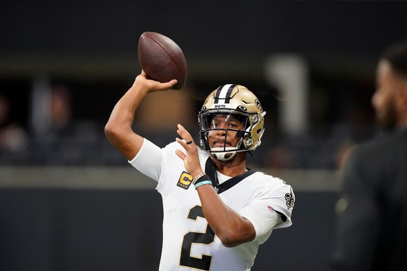 New Orleans Saints quarterback Jameis Winston (2) warms up before the first half of an NFL football game between the Atlanta Falcons and the New Orleans Saints, Sunday, Sept. 11, 2022, in Atlanta. (AP Photo/Brynn Anderson)