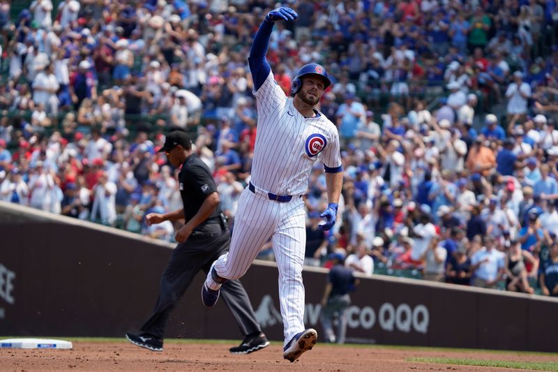 Aug 3, 2024; Chicago, Illinois, USA; Chicago Cubs first baseman Michael Busch (29) gestures after hitting a two-run home run against the St. Louis Cardinals during the first inning at Wrigley Field. Mandatory Credit: David Banks-USA TODAY Sports