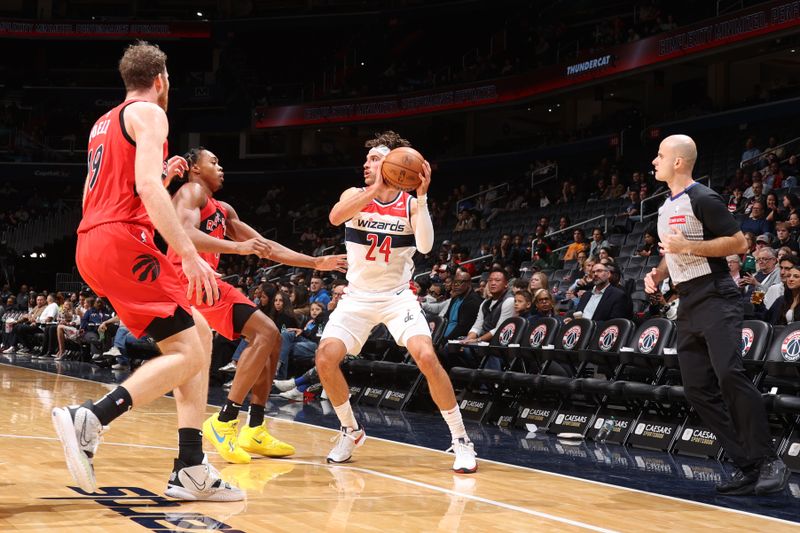 WASHINGTON, DC -? OCTOBER 11: Corey Kispert #24 of the Washington Wizards handles the ball during the game against the Toronto Raptors during a NBA preseason game on October 11, 2024 at Capital One Arena in Washington, DC. NOTE TO USER: User expressly acknowledges and agrees that, by downloading and or using this Photograph, user is consenting to the terms and conditions of the Getty Images License Agreement. Mandatory Copyright Notice: Copyright 2024 NBAE (Photo by Stephen Gosling/NBAE via Getty Images)