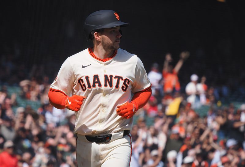 Apr 9, 2025; San Francisco, California, USA;  San Francisco Giants pinch hitter Patrick Bailey (14) scores a run against the Cincinnati Reds during the sixth inning at Oracle Park. Mandatory Credit: Kelley L Cox-Imagn Images
