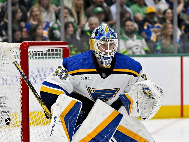 Apr 17, 2024; Dallas, Texas, USA; St. Louis Blues goaltender Jordan Binnington (50) faces the Dallas Stars attack during the second period at the American Airlines Center. Mandatory Credit: Jerome Miron-USA TODAY Sports