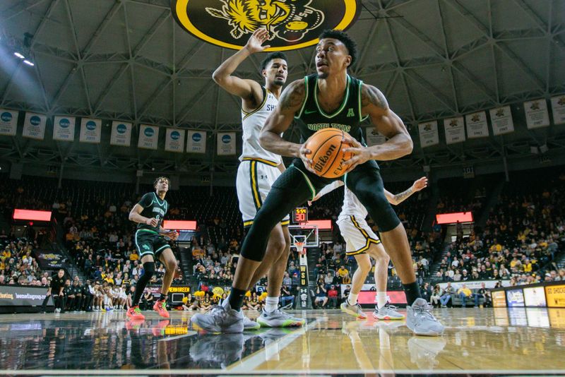 Jan 4, 2024; Wichita, Kansas, USA; North Texas Mean Green forward Robert Allen (10) works the baseline during the second half against the Wichita State Shockers at Charles Koch Arena. Mandatory Credit: William Purnell-USA TODAY Sports