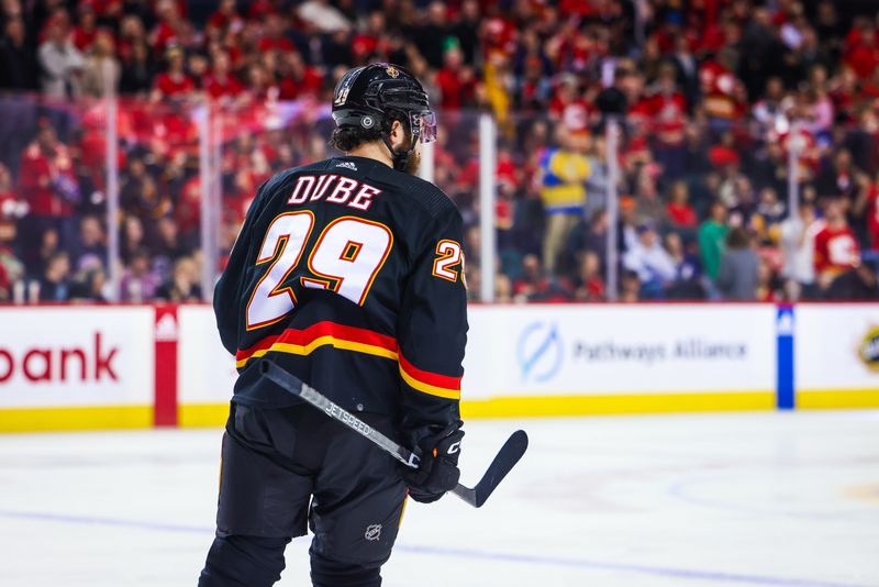 Jan 21, 2023; Calgary, Alberta, CAN; Calgary Flames center Dillon Dube (29) scores a goal against the Tampa Bay Lightning during the third period at Scotiabank Saddledome. Mandatory Credit: Sergei Belski-USA TODAY Sports