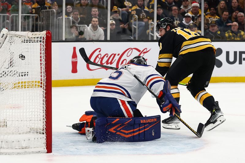 Dec 18, 2025; Boston, Massachusetts, USA; Boston Bruins center Pavel Zacha (18) scores on Edmonton Oilers goaltender Tristan Jarry (35) during the first period at TD Garden. Mandatory Credit: Winslow Townson-Imagn Images