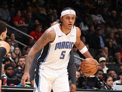 WASHINGTON, DC -? DECEMBER 26:  Paolo Banchero #5 of the Orlando Magic handles the ball during the game  on December 26, 2023 at Capital One Arena in Washington, DC. NOTE TO USER: User expressly acknowledges and agrees that, by downloading and or using this Photograph, user is consenting to the terms and conditions of the Getty Images License Agreement. Mandatory Copyright Notice: Copyright 2023 NBAE (Photo by Stephen Gosling/NBAE via Getty Images)