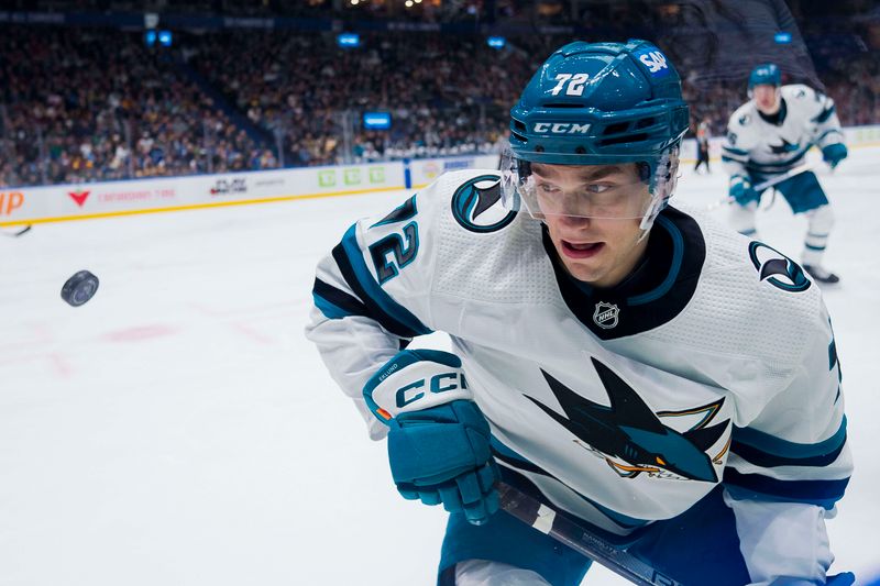 Dec 23, 2023; Vancouver, British Columbia, CAN; San Jose Sharks forward William Eklund (72) looks for the flying puck against the Vancouver Canucks  in the second period at Rogers Arena. Mandatory Credit: Bob Frid-USA TODAY Sports