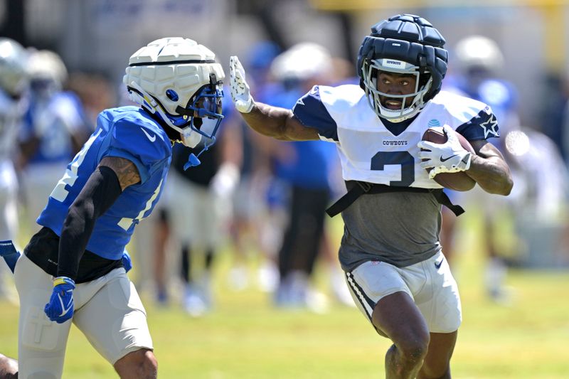 Los Angeles Rams cornerback Cobie Durant, left, defends against Dallas Cowboys wide receiver Brandin Cooks, right, during a joint practice with the Dallas Cowboys at NFL football training camp Thursday, Aug. 8, 2024, in Oxnard, Calif. (AP Photo/Jayne Kamin-Oncea)