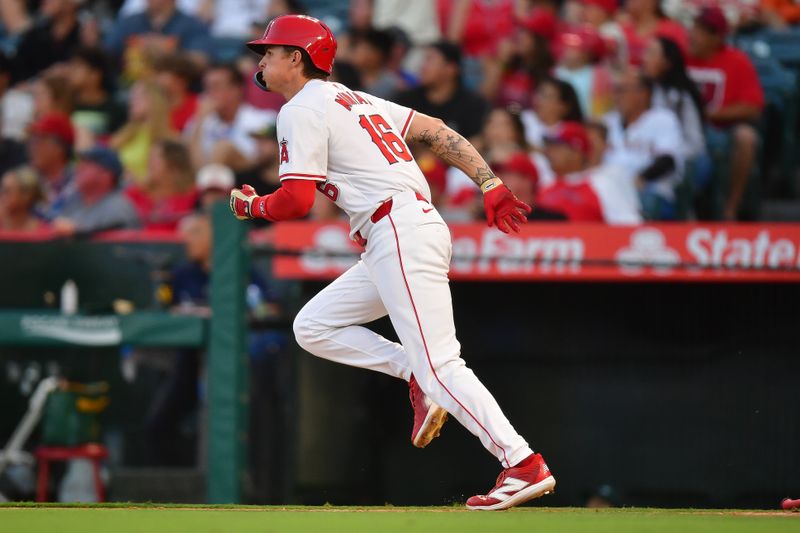 Jun 25, 2024; Anaheim, California, USA; Los Angeles Angels center fielder Mickey Moniak (16) runs after hitting a grand slam home run against the Oakland Athletics during the fourth inning at Angel Stadium. Mandatory Credit: Gary A. Vasquez-USA TODAY Sports