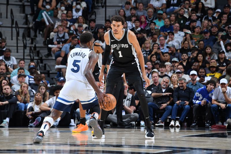 SAN ANTONIO, TX - NOVEMBER 2: Victor Wembanyama #1 of the San Antonio Spurs plays defense during the game against the Minnesota Timberwolves on November 2, 2024 at the Frost Bank Center in San Antonio, Texas. NOTE TO USER: User expressly acknowledges and agrees that, by downloading and or using this photograph, user is consenting to the terms and conditions of the Getty Images License Agreement. Mandatory Copyright Notice: Copyright 2024 NBAE (Photos by Michael Gonzales/NBAE via Getty Images)