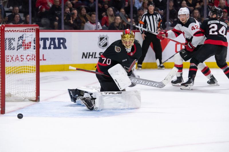 Apr 6, 2024; Ottawa, Ontario, CAN; Ottawa Senators goalie Joonas Korpisalo (70) follows the puck after making a save on a shot from New Jersey Devils center Curtis Lazar (42) in the second period at the Canadian Tire Centre. Mandatory Credit: Marc DesRosiers-USA TODAY Sports