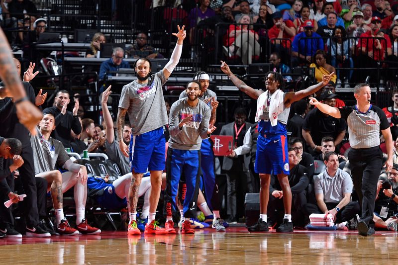 HOUSTON, TX - MARCH 6: The LA Clippers bench celebrates three point basket during the game against the Houston Rockets on March 6, 2024 at the Toyota Center in Houston, Texas. NOTE TO USER: User expressly acknowledges and agrees that, by downloading and or using this photograph, User is consenting to the terms and conditions of the Getty Images License Agreement. Mandatory Copyright Notice: Copyright 2024 NBAE (Photo by Logan Riely/NBAE via Getty Images)