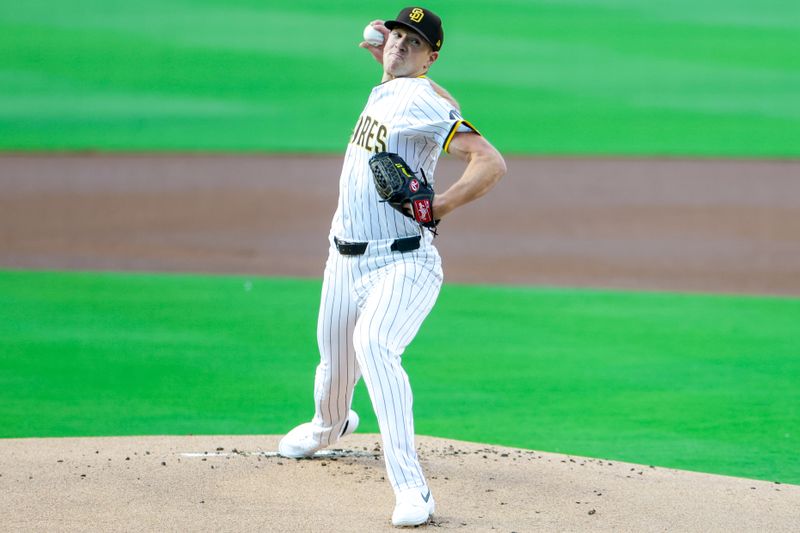 Jun 9, 2025; San Diego, California, USA; San Diego Padres starting pitcher Nick Pivetta (27) throws a pitch during the first inning against the Los Angeles Dodgers at Petco Park. Mandatory Credit: David Frerker-Imagn Images