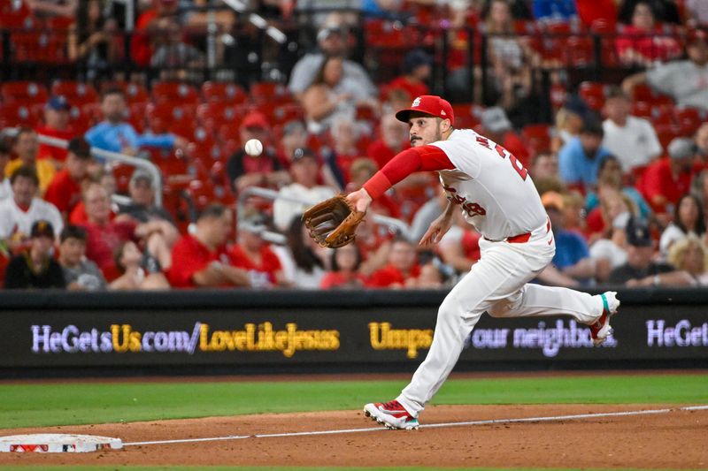 Jun 12, 2024; St. Louis, Missouri, USA;  St. Louis Cardinals third baseman Nolan Arenado (28) fields a ball against the Pittsburgh Pirates during the eighth inning at Busch Stadium. Mandatory Credit: Jeff Curry-USA TODAY Sports