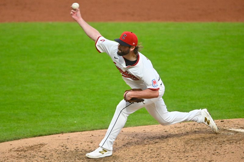 Apr 28, 2025; Cleveland, Ohio, USA; Cleveland Guardians relief pitcher Cody Bolton (58) delivers a pitch in the sixth inning against the Minnesota Twins at Progressive Field. Mandatory Credit: David Richard-Imagn Images