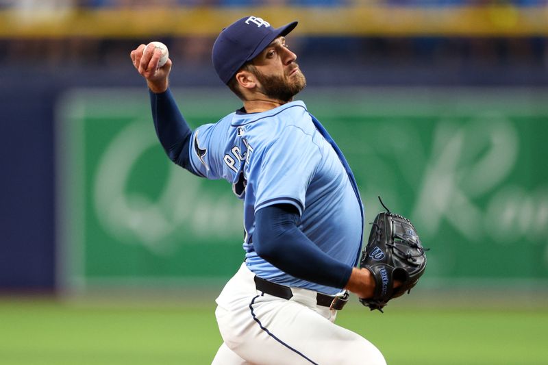 Apr 18, 2024; St. Petersburg, Florida, USA;  Tampa Bay Rays pitcher Colin Poche (38) throws a pitch against the Los Angeles Angels in the ninth inning at Tropicana Field. Mandatory Credit: Nathan Ray Seebeck-USA TODAY Sports