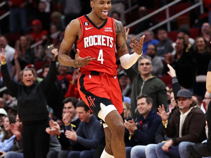 HOUSTON, TEXAS - JANUARY 23: Jalen Green #4 of the Houston Rockets reacts after making a three point basket against the Minnesota Timberwolves during the fourth quarter at Toyota Center on January 23, 2023 in Houston, Texas.  NOTE TO USER: User expressly acknowledges and agrees that, by downloading and or using this photograph, User is consenting to the terms and conditions of the Getty Images License Agreement. (Photo by Bob Levey/Getty Images)