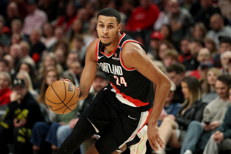 PORTLAND, OREGON - JANUARY 14: Kris Murray #24 of the Portland Trail Blazers dribbles against the Brooklyn Nets during the first half at Moda Center on January 14, 2025 in Portland, Oregon. NOTE TO USER: User expressly acknowledges and agrees that, by downloading and or using this photograph, User is consenting to the terms and conditions of the Getty Images License Agreement. (Photo by Steph Chambers/Getty Images)