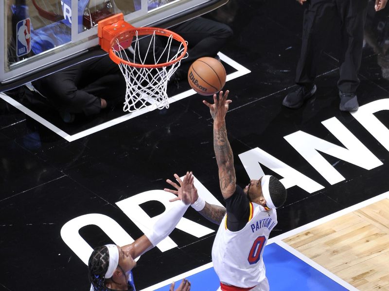 ORLANDO, FL - FEBRUARY 27:  Gary Payton II #0 of the Golden State Warriors drives to the basket during the game against the Orlando Magic on February 27, 2025 at Kia Center in Orlando, Florida. NOTE TO USER: User expressly acknowledges and agrees that, by downloading and or using this photograph, User is consenting to the terms and conditions of the Getty Images License Agreement. Mandatory Copyright Notice: Copyright 2025 NBAE (Photo by Fernando Medina/NBAE via Getty Images)