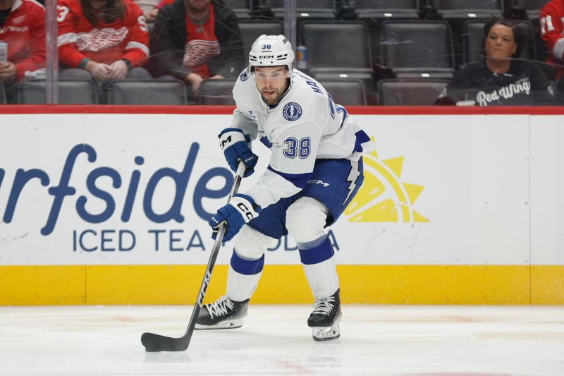Oct 17, 2025; Detroit, Michigan, USA; Tampa Bay Lightning left wing Brandon Hagel (38) handles the puck during the first period of the game against the Detroit Red Wings at Little Caesars Arena. Mandatory Credit: Brian Bradshaw Sevald-Imagn Images