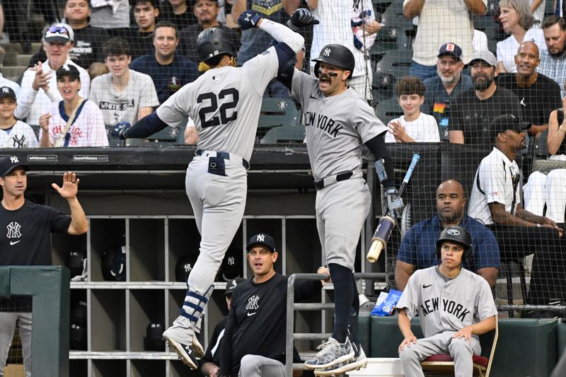Aug 14, 2024; Chicago, Illinois, USA;  New York Yankees outfielder Juan Soto (22) celebrates with catcher Austin Wells (28) after he hit a home run against the Chicago White Sox during the first inning at Guaranteed Rate Field. Mandatory Credit: Matt Marton-USA TODAY Sports
