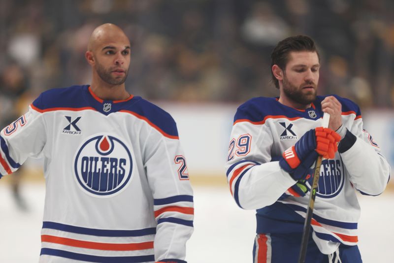 Dec 16, 2025; Pittsburgh, Pennsylvania, USA;  Edmonton Oilers defenseman Darnell Nurse (25) and center Leon Draisaitl (29) warm up before the game against the Pittsburgh Penguins at PPG Paints Arena. Mandatory Credit: Charles LeClaire-Imagn Images