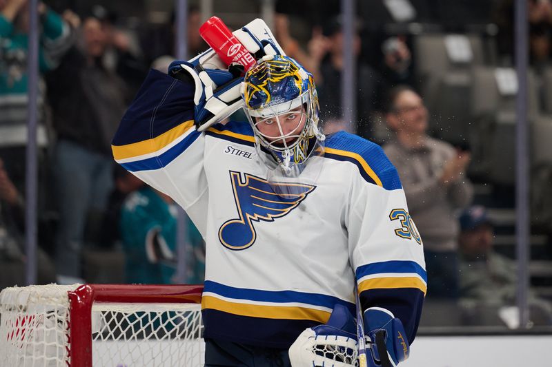 Nov 16, 2023; San Jose, California, USA; St. Louis Blues goaltender Joel Hofer (30) reacts after allowing three goals in the second period against the San Jose Sharks at SAP Center at San Jose. Mandatory Credit: Robert Edwards-USA TODAY Sports