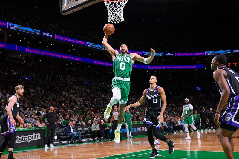 BOSTON, MA - APRIL 5: Jayson Tatum #0 of the Boston Celtics dunks the ball during the game against the Sacramento Kings  on April 5, 2024 at the TD Garden in Boston, Massachusetts. NOTE TO USER: User expressly acknowledges and agrees that, by downloading and or using this photograph, User is consenting to the terms and conditions of the Getty Images License Agreement. Mandatory Copyright Notice: Copyright 2024 NBAE  (Photo by Brian Babineau/NBAE via Getty Images)