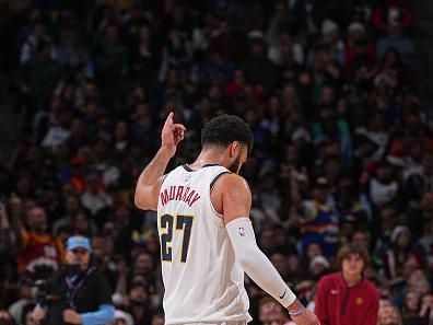 DENVER, CO - DECEMBER 25: Jamal Murray #27 of the Denver Nuggets signals during the game against the Golden State Warriors on December 25, 2023 at the Ball Arena in Denver, Colorado. NOTE TO USER: User expressly acknowledges and agrees that, by downloading and/or using this Photograph, user is consenting to the terms and conditions of the Getty Images License Agreement. Mandatory Copyright Notice: Copyright 2023 NBAE (Photo by Bart Young/NBAE via Getty Images)