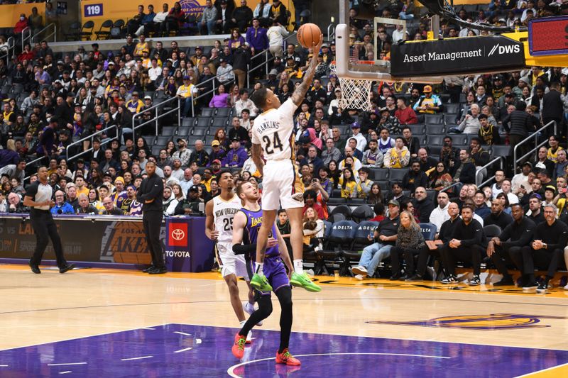 LOS ANGELES, CA - FEBRUARY 9: Jordan Hawkins #24 of the New Orleans Pelicans drives to the basket during the game against the Los Angeles Lakers on February 9, 2024 at Crypto.Com Arena in Los Angeles, California. NOTE TO USER: User expressly acknowledges and agrees that, by downloading and/or using this Photograph, user is consenting to the terms and conditions of the Getty Images License Agreement. Mandatory Copyright Notice: Copyright 2024 NBAE (Photo by Andrew D. Bernstein/NBAE via Getty Images)