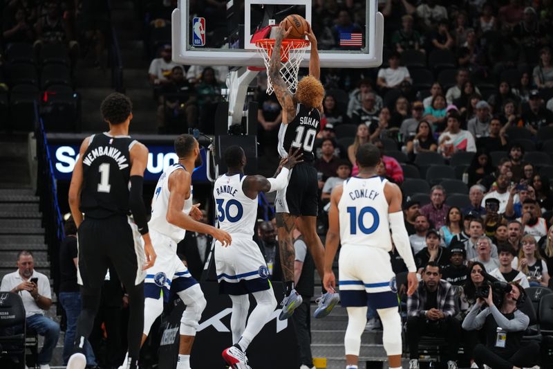 SAN ANTONIO, TX - NOVEMBER 2: Jeremy Sochan #10 of the San Antonio Spurs dunks the ball during the game against the Minnesota Timberwolves on November 2, 2024 at the Frost Bank Center in San Antonio, Texas. NOTE TO USER: User expressly acknowledges and agrees that, by downloading and or using this photograph, user is consenting to the terms and conditions of the Getty Images License Agreement. Mandatory Copyright Notice: Copyright 2024 NBAE (Photos by Cooper Neill/NBAE via Getty Images)