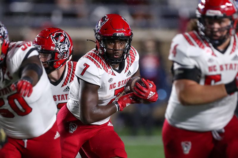 Oct 16, 2021; Chestnut Hill, Massachusetts, USA; North Carolina State Wolfpack running back Zonovan Knight (7) runs the ball during the first half against the Boston College Eagles at Alumni Stadium. Mandatory Credit: Paul Rutherford-USA TODAY Sports