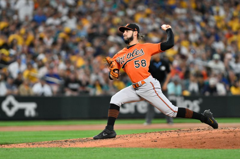 Aug 12, 2023; Seattle, Washington, USA; Baltimore Orioles relief pitcher Cionel Perez (58) pitches to the Seattle Mariners during the sixth inning at T-Mobile Park. Mandatory Credit: Steven Bisig-USA TODAY Sports