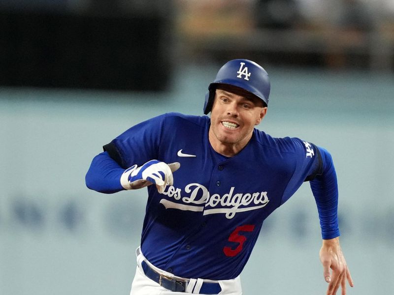 Jul 25, 2023; Los Angeles, California, USA; Los Angeles Dodgers left fielder David Peralta (6) rounds second bse in the third inning against the Toronto Blue Jays at Dodger Stadium. Mandatory Credit: Kirby Lee-USA TODAY Sports