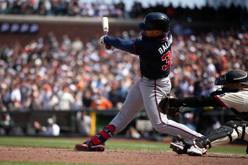 Jun 8, 2025; San Francisco, California, USA; Atlanta Braves pinch hitter Drake Baldwin (30) swings and misses for strike three and the final out during the ninth inning against the San Francisco Giants at Oracle Park. Mandatory Credit: D. Ross Cameron-Imagn Images