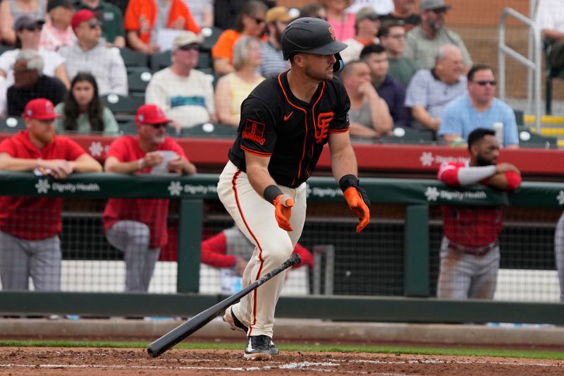 Feb 26, 2024; Scottsdale, Arizona, USA; San Francisco Giants catcher Joey Bart (21) hits a single against the Los Angeles Angels in the second inning at Scottsdale Stadium. Mandatory Credit: Rick Scuteri-USA TODAY Sports