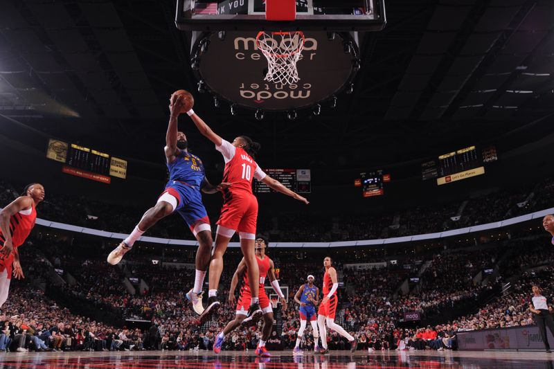 PORTLAND, OR - MARCH 23: DeAndre Jordan #6 of the Denver Nuggets drives to the basket during the game against the Portland Trail Blazers on March 23, 2024 at the Moda Center Arena in Portland, Oregon. NOTE TO USER: User expressly acknowledges and agrees that, by downloading and or using this photograph, user is consenting to the terms and conditions of the Getty Images License Agreement. Mandatory Copyright Notice: Copyright 2024 NBAE (Photo by Cameron Browne/NBAE via Getty Images)