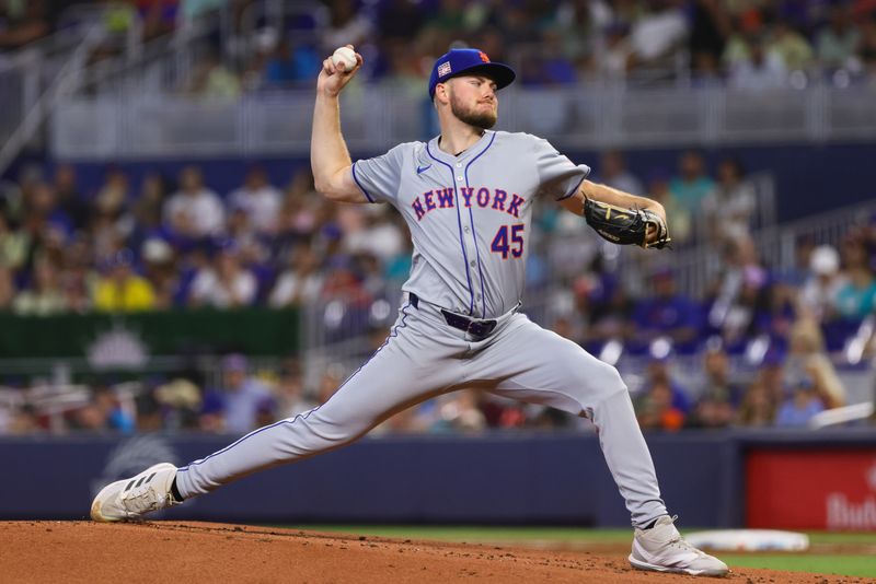 Jul 21, 2024; Miami, Florida, USA; New York Mets starting pitcher Christian Scott (45) delivers a pitch against the Miami Marlins during the first inning at loanDepot Park. Mandatory Credit: Sam Navarro-USA TODAY Sports