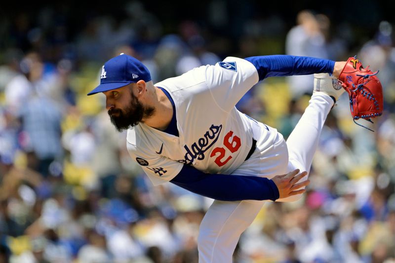 Apr 30, 2025; Los Angeles, California, USA; Los Angeles Dodgers starting pitcher Tony Gonsolin (26) pitches against the Miami Marlins during the fourth inning at Dodger Stadium. Mandatory Credit: Jayne Kamin-Oncea-Imagn Images