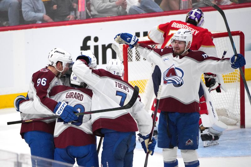 Nov 23, 2024; Sunrise, Florida, USA;  Colorado Avalanche right wing Mikko Rantanen (96) celebrates a goal against the Florida Panthers with teammates in the second period at Amerant Bank Arena. Mandatory Credit: Jim Rassol-Imagn Images