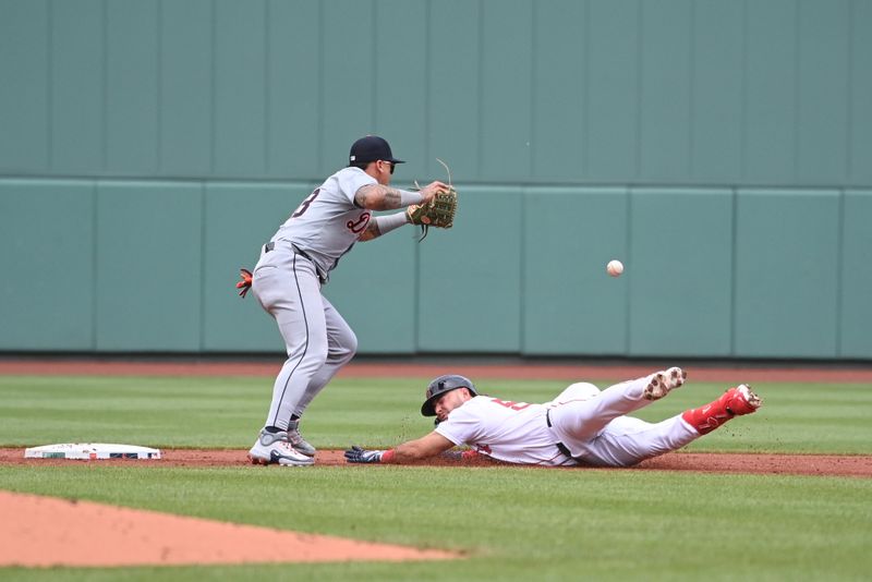 Jun 2, 2024; Boston, Massachusetts, USA;  Boston Red Sox right fielder Wilyer Abreu (52) slides safe into second base covered by Detroit Tigers shortstop Javier Baez (28) during the first inning at Fenway Park. Mandatory Credit: Eric Canha-USA TODAY Sports