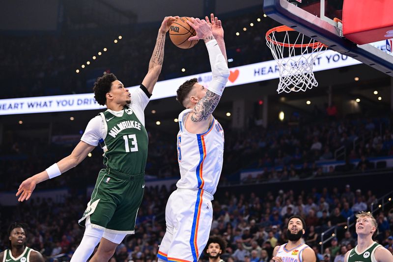 OKLAHOMA CITY, OKLAHOMA - FEBRUARY 03: Ryan Rollins #13 of the Milwaukee Bucks blocks the shot of Isaiah Hartenstein #55 of the Oklahoma City Thunder during the first half at Paycom Center on February 3, 2025 in Oklahoma City, Oklahoma. NOTE TO USER: User expressly acknowledges and agrees that, by downloading and or using this Photograph, user is consenting to the terms and conditions of the Getty Images License Agreement. (Photo by Joshua Gateley/Getty Images)