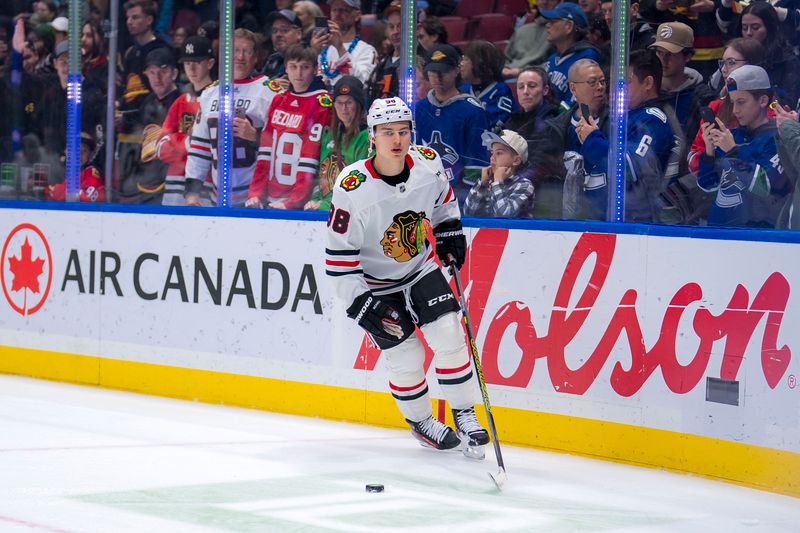 Nov 16, 2024; Vancouver, British Columbia, CAN; Chicago Blackhawks forward Connor Bedard (98) skates during warm up prior to a game against the Vancouver Canucks at Rogers Arena. Mandatory Credit: Bob Frid-Imagn Images