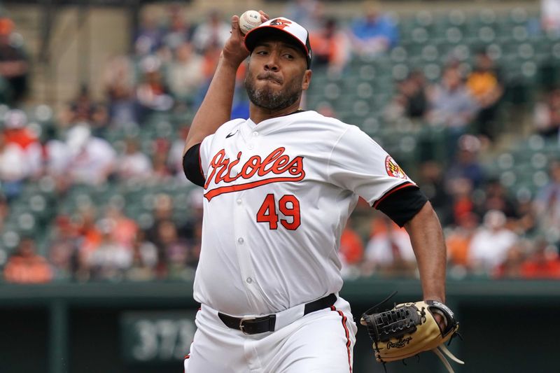 Apr 17, 2024; Baltimore, Maryland, USA; Baltimore Orioles pitcher Albert Suarez (4) delivers in the first inning against the Minnesota Twins at Oriole Park at Camden Yards. Mandatory Credit: Mitch Stringer-USA TODAY Sports