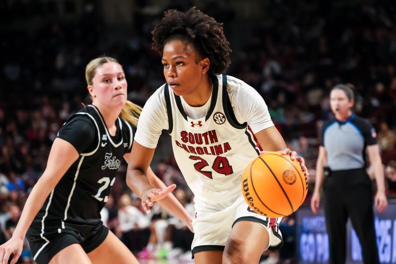 Dec 28, 2025; Columbia, South Carolina, USA; South Carolina Gamecocks guard Ayla McDowell (24) drives against the Providence Friars in the first half at Colonial Life Arena. Mandatory Credit: Jeff Blake-Imagn Images